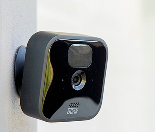 Blink outdoor security camera on exterior wall