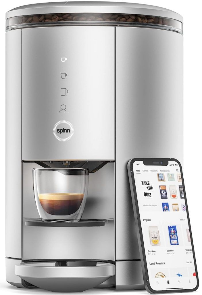 SPINN smart coffee and espresso maker next to smartphone