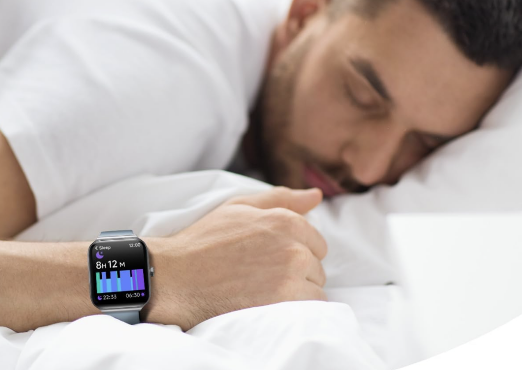 man sleeping wearing Android smartwatch