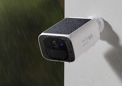 outdoor solar security camera mounted on exterior wall