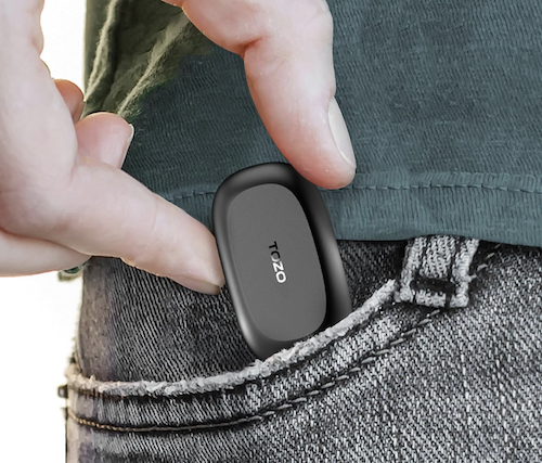 person putting TOZO A1 Mini wireless earbuds in pants pocket