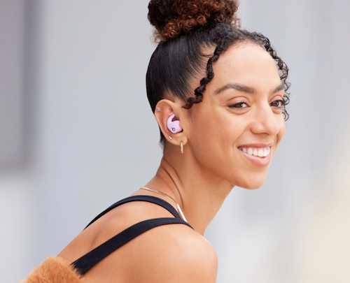 woman wearing in-ear Beats Fit Pro earbuds