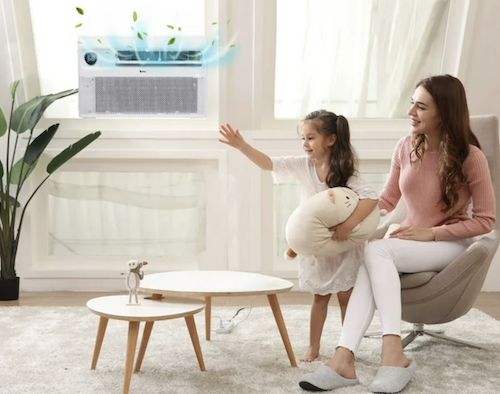 smart air conditioner in room with mother and daughter