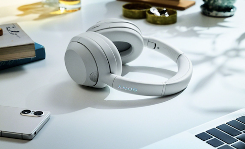 Sony wireless headphones in white on desk